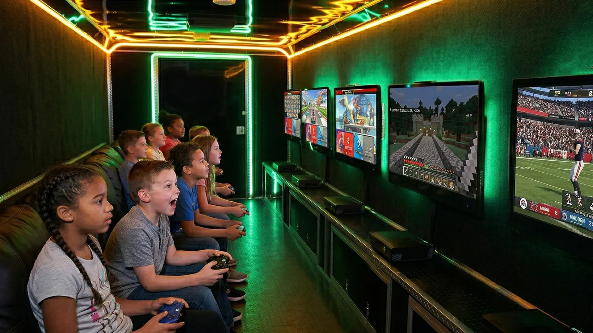 Kids playing video games inside climate-controlled gaming theater