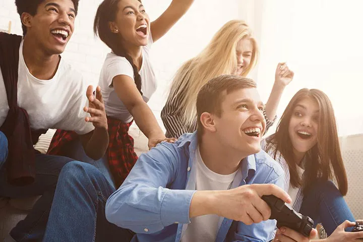 Excited group of kids celebrating a win during a Gameplex birthday party